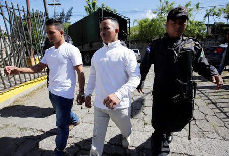 The detainees charged with the murder of indigenous environmental activist Berta Caceres arrive to court for their trial, in Tegucigalpa, Honduras, November 29, 2018. REUTERS/Jorge Cabrera