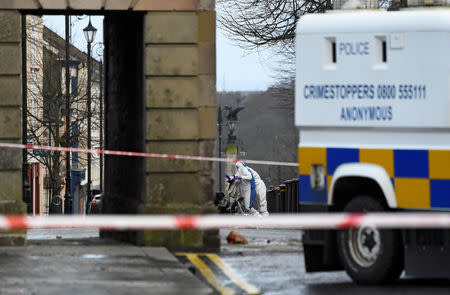 Forensic officers inspect the scene of a suspected car bomb in Londonderry, Northern Ireland January 20, 2019. REUTERS/Clodagh Kilcoyne