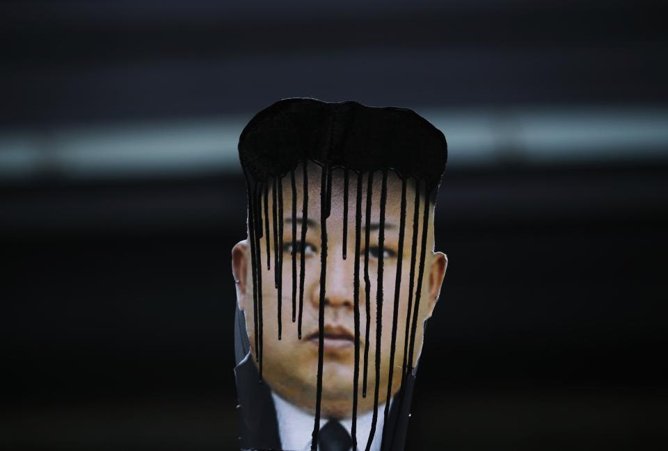 A view of a defaced portrait of North Korean leader Kim Jong Un during an anti-North Korean rally on the 102nd birthday of North Korean founder Kim Il Sung in central Seoul