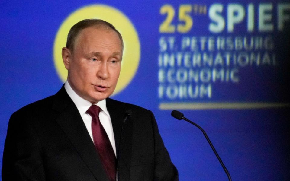 Putin struck a defiant tone at the end of a defensive and combative speech - AP