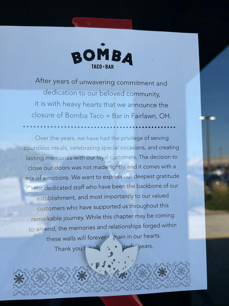 A letter outside Bomba in Copley addresses the restaurant's closing.