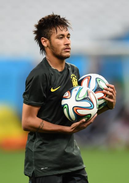 Neymar is very familiar with the Brazuca. He leads the 2014 World Cup with four goals in three games. (Getty)