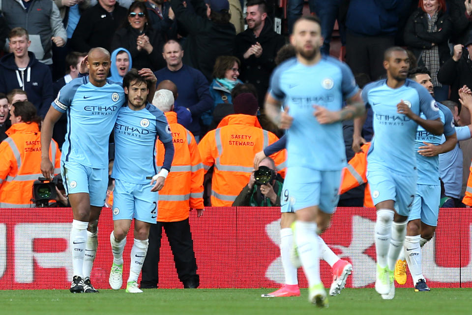 Manchester City’s Vincent Kompany (left) celebrates scoring his side’s first goal of the game during the Premier League match at St Mary’s Stadium, Southampton.
