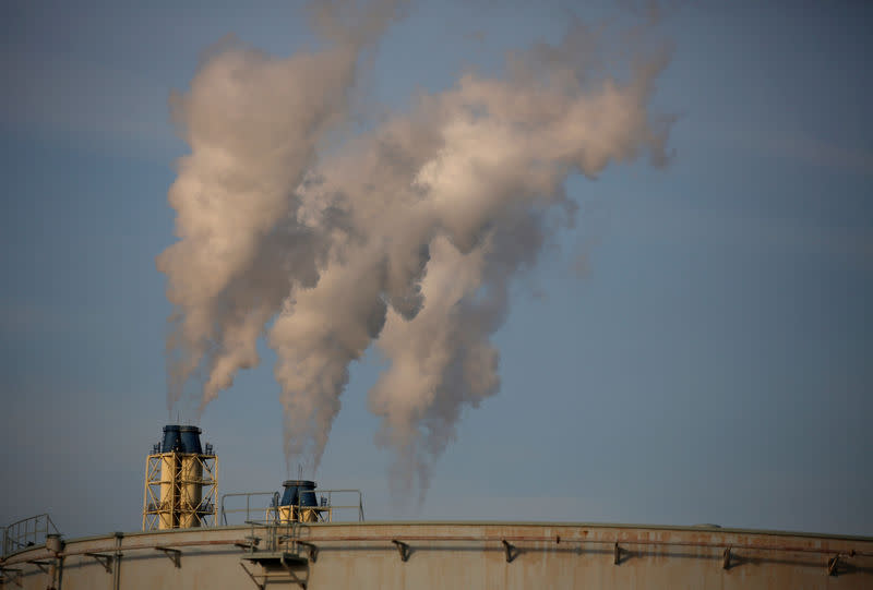 Steam is emitted from a oil refinery in Sodegaura, Japan February 8, 2017. Picture taken February 8, 2017. REUTERS/Issei Kato