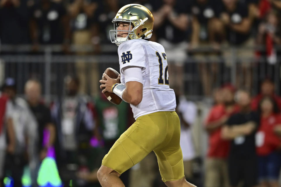 Notre Dame quarterback Tyler Buchner looks to throw during the first quarter of an NCAA college football game against Ohio State, Saturday, Sept. 3, 2022, in Columbus, Ohio. (AP Photo/David Dermer)