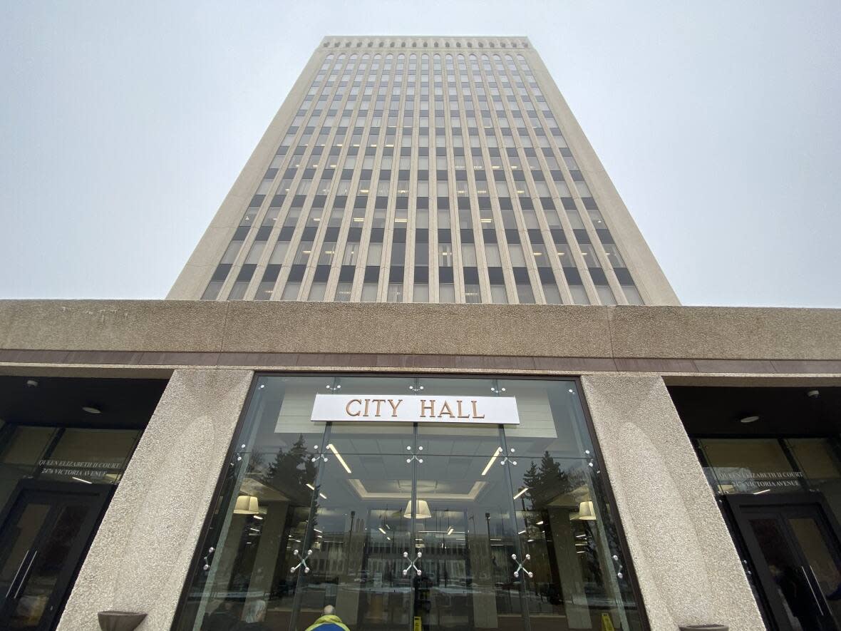 City Hall pictured in Regina. Firefighters in the city are helping out at an SHA vaccination site.  (Kirk Fraser/CBC - image credit)