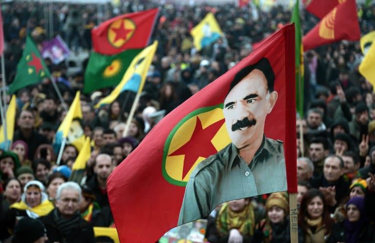 File picture shows members of the Kurdish community waving flags and banners picturing convicted Kurdistan Worker's Party (PKK) leader Abdullah Ocalan during a demonstration calling his release in Strasbourg, eastern France