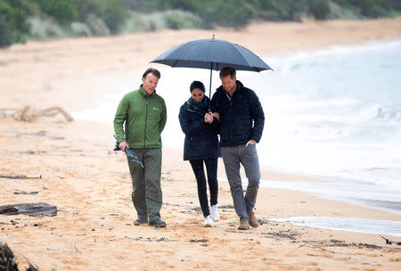 Britain's Prince Harry and Meghan, Duchess of Sussex visit a beach at Abel Tasman National Park, which sits at the north-Eastern tip of the South Island, New Zealand to visit some of the conservation initiatives managed by the Department of Conservation, October 29, 2018. Paul Edwards/Pool via REUTERS