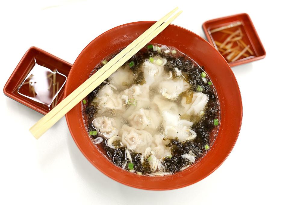 Fresh-made pork dumplings and soup from Shanghai Soup Dumplings in the Kam Man Shopping Center on Quincy Avenue in Quincy on Monday, April 15, 2024.