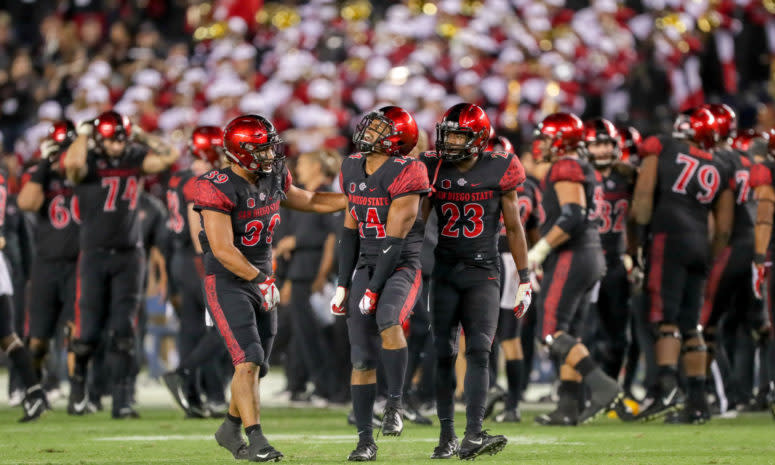 Tariq Thompson celebrates on the field.