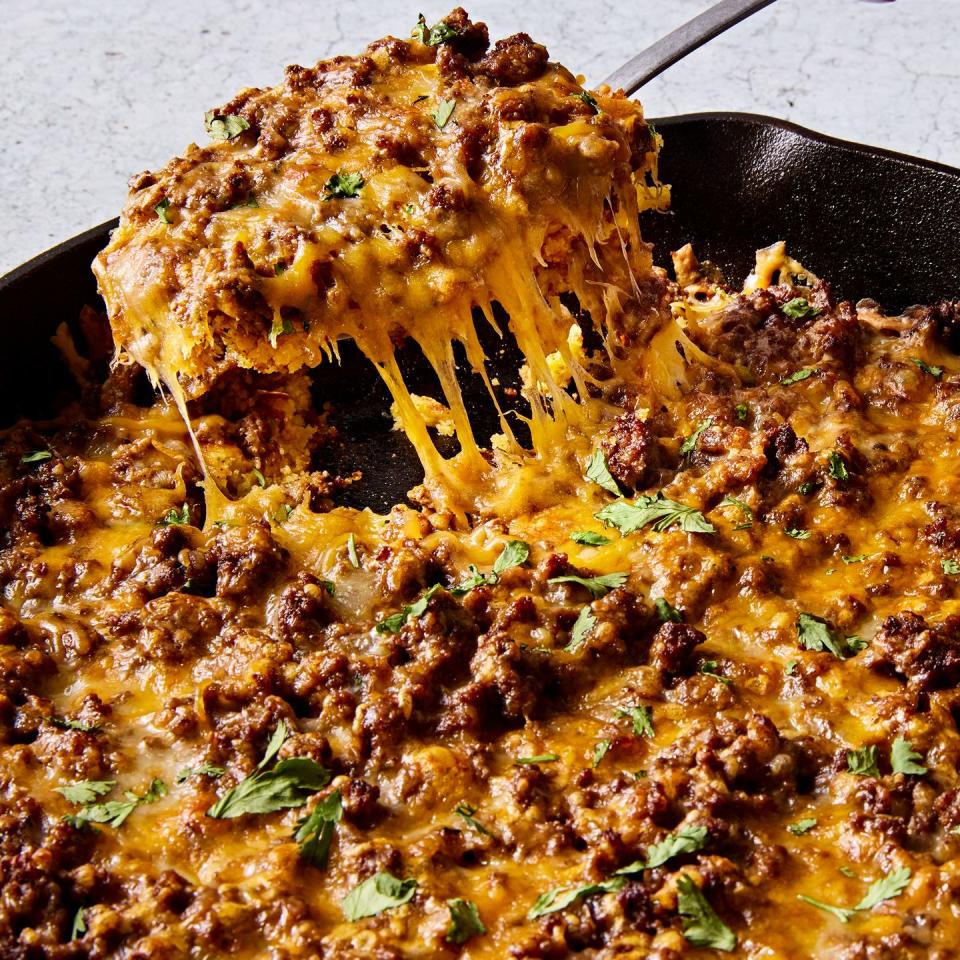 tamale pie with cheese and cilantro on top