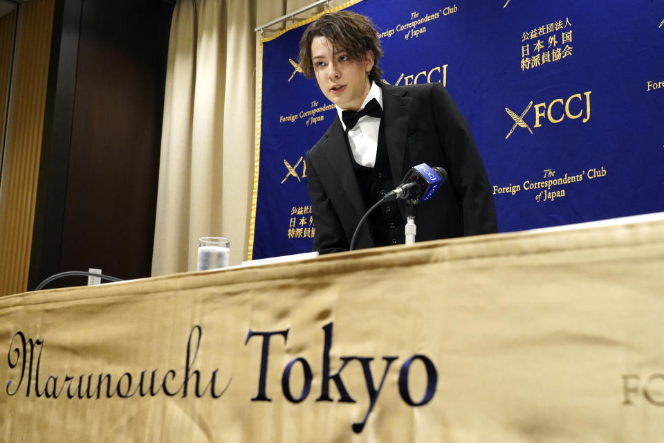 Kauan Okamoto, a musician also a former member of Japanese pop group Johnny's Junior, attends a press conference at the Foreign Correspondents' Club of Japan Wednesday, April 12, 2023, in Tokyo. When Johnny Kitagawa told one of the boys staying at his luxury house to go to bed early, everyone knew “it was your turn.” That was among the recollections shared Wednesday by Okamoto, then 15, about allegedly being sexually assaulted by Kitagawa, a powerful figure in the Japanese entertainment world. (AP Photo/Eugene Hoshiko)