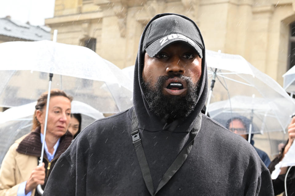 Kanye West attends the Givenchy Womenswear Spring/Summer 2023 Collection show as part of Paris Fashion Week on October 2, 2022 in Paris, France.  (Photo credit: Stephane Cardinale - Corbis/Corbis via Getty Images)