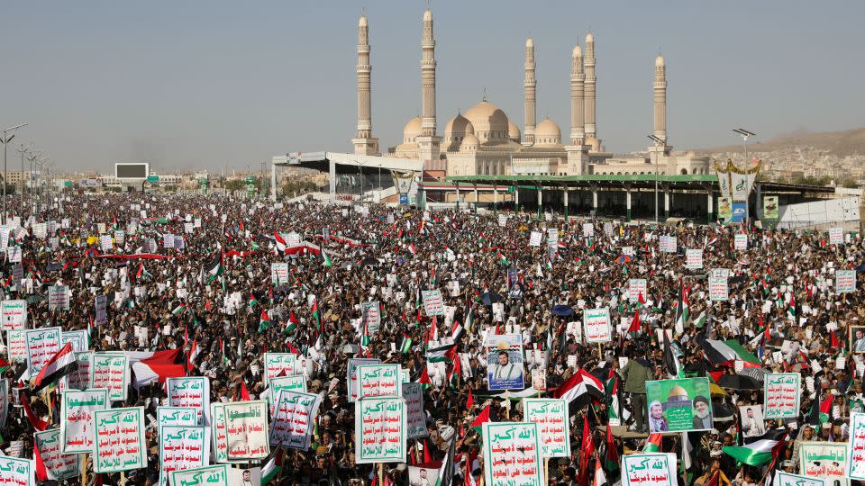 Houthi supporters rally in Sanaa on Friday, to denounce air strikes launched by the US and UK. - Khaled Abdullah/Reuters