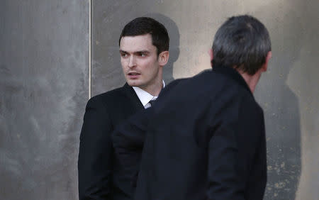 Sunderland soccer player Adam Johnson leaves Bradford Crown Court in Bradford, Britain February 10, 2016. REUTERS/Andrew Yates