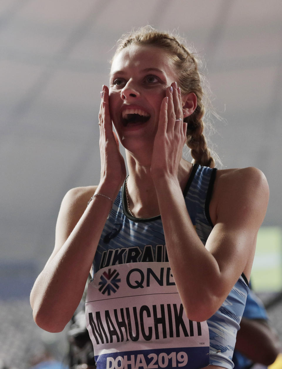 Yaroslava Mahuchikh, of Ukraine reacts after making a clearance in the women's high jump final at the World Athletics Championships in Doha, Qatar, Monday, Sept. 30, 2019. (AP Photo/Nariman El-Mofty)