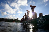 <p>Swimmers prepa start the race in the Women's 10km Marathon Swimming on day twelve of the Tokyo 2020 Olympic Games at Odaiba Marine Park on August 04, 2021 in Tokyo, Japan. (Photo by Antonio Bronic - Pool/Getty Images)</p> 