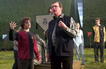 <p>Daniel Radcliffe and director Mike Newell on the set of Warner Bros. Pictures' Harry Potter and the Goblet of Fire - 2005</p>