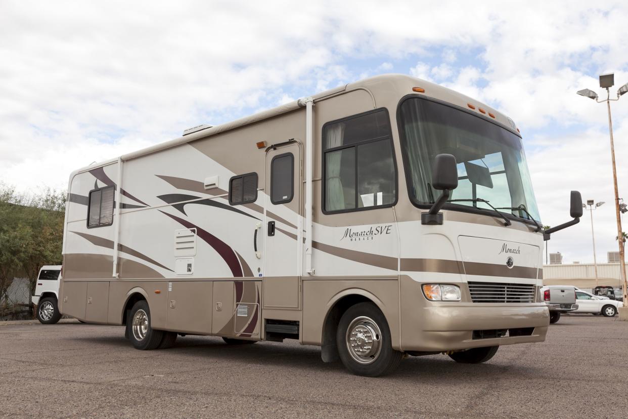 rv in big-box parking lot