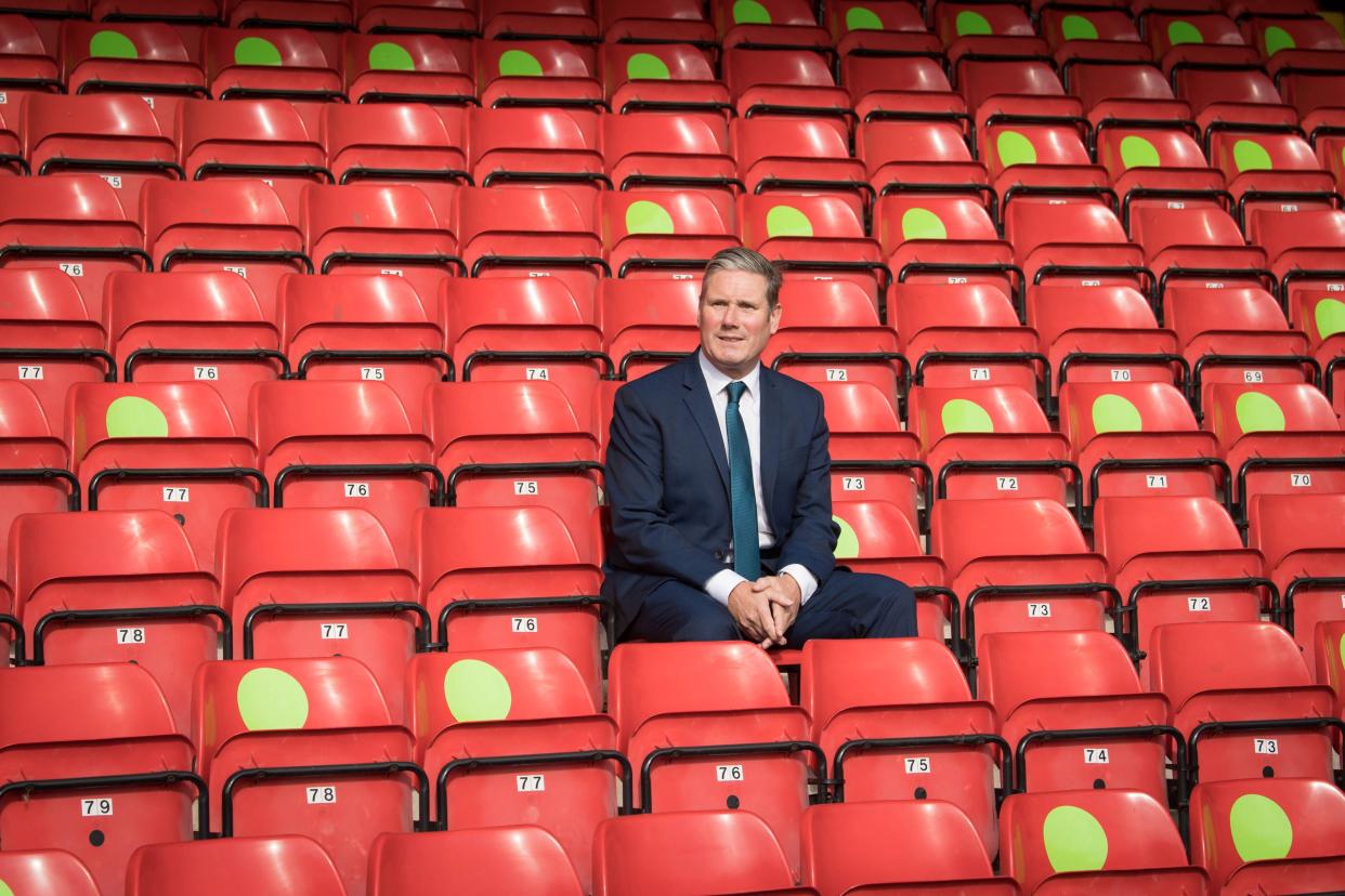 Labour Leader Sir Keir Starmer during a visit to Walsall football club's Banks Stadium to learn about their community work during the pandemic and discuss efforts to reopen sports stadiums in a Covid-secure way (PA)