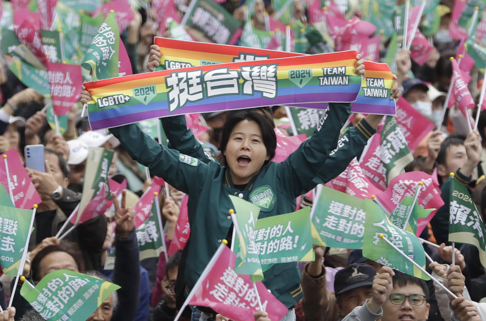 Supporters of Taiwan President and Democratic Progressive Party presidential candidate William Lai cheer as Lai launches his election campaign in Taipei, Taiwan, Sunday, Dec. 3, 2023. Taiwan will hold its presidential election on Jan. 13, 2024. (AP Photo/Chiang Ying-ying)