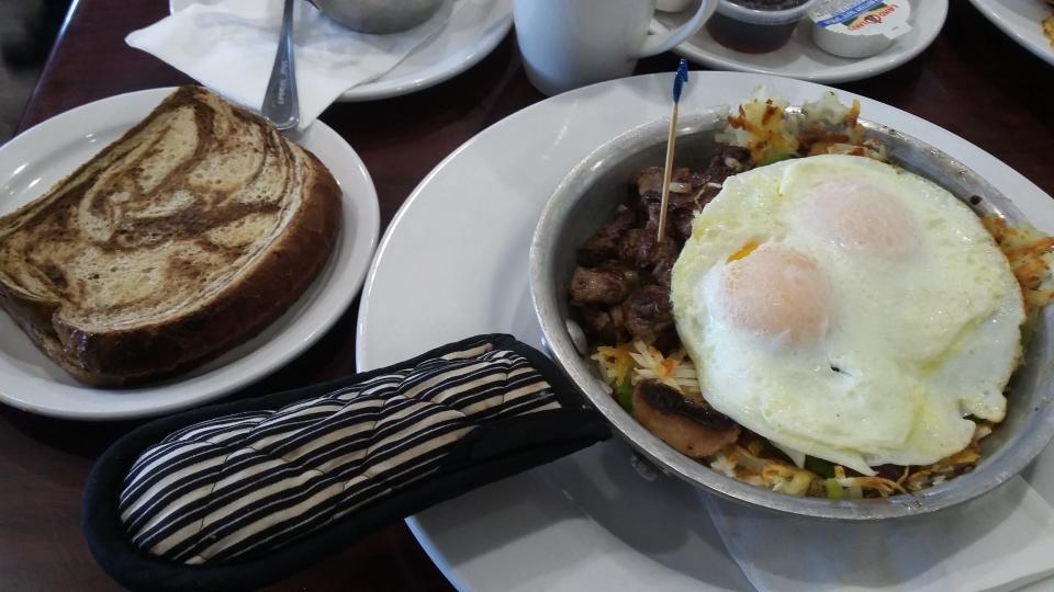 The Gypsy steak skillet with rye toast is one of the breakfast choices at Sweet Basil Cafe in Peoria.