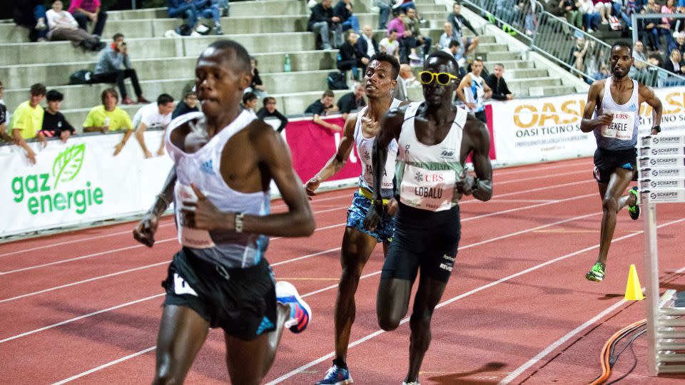 Lobalu, sporting yellow sunglasses, competes in a 3,000-meter event in Switzerland last year. - Valerio Origo/LiveMedia/NurPhoto/Getty Images