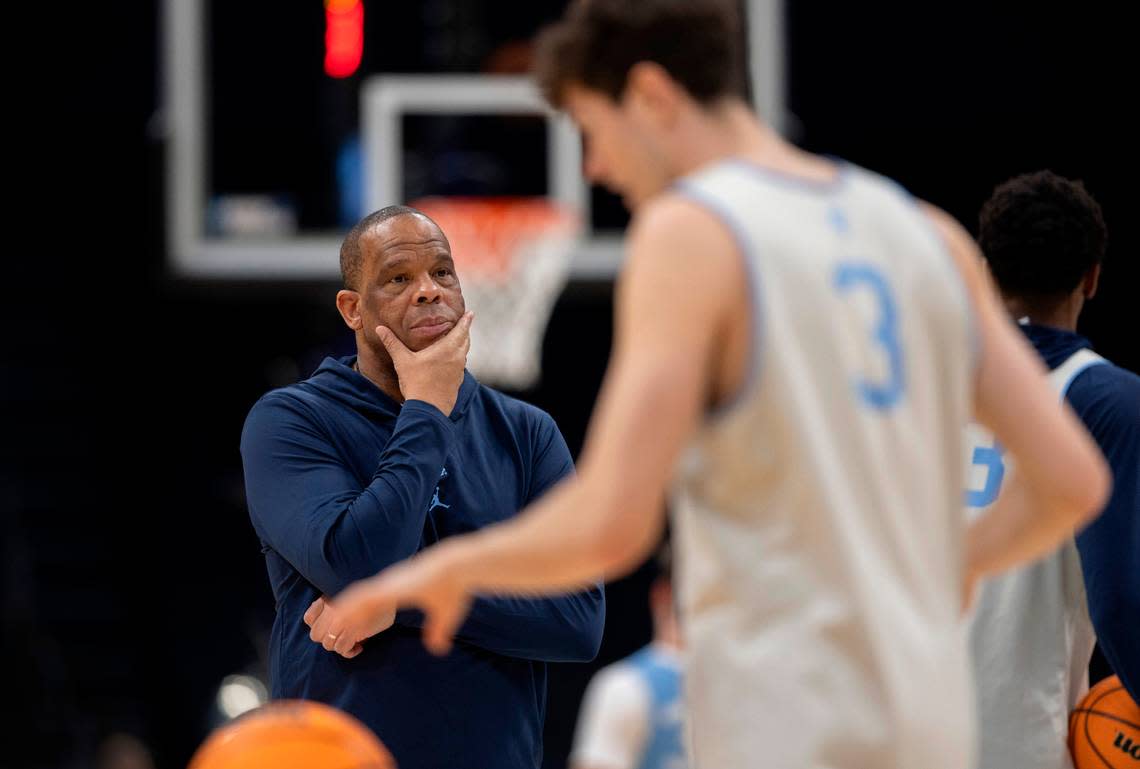 North Carolina coach Hubert Davis watches his players during their workout on Wednesday, March 20, 2024 as they prepare for the NCAA Tournament at Spectrum Center in Charlotte, N.C. Robert Willett/rwillett@newsobserver.com