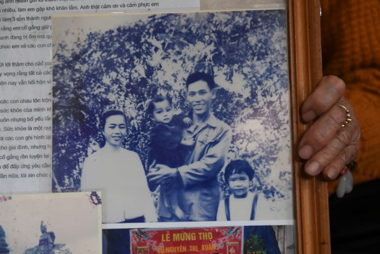 A 1947 photograph of Nguyen Thi Xuan and her Japanese husband Shimizu (only one name available) and their two children at her home on the outskirts of Hanoi