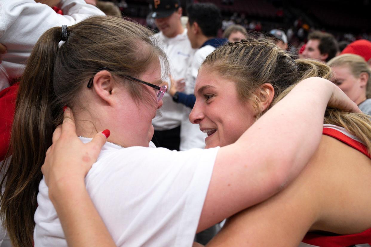 Ohio State guard Jacy Sheldon, right, celebrates with her sister Emmy after winning a game against Tennessee on Nov. 8. 2022.