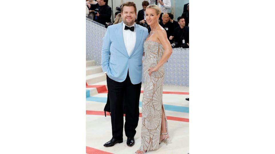 James Corden in a blue jacket with his wife Julia Carey in an embellished gown at the 2023 Met Gala