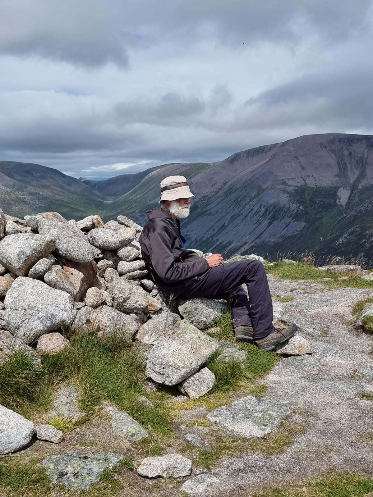 The intrepid grandfather has a moment of reflection with just eight more Munros to climb (Nick Gardner Collection/PA)