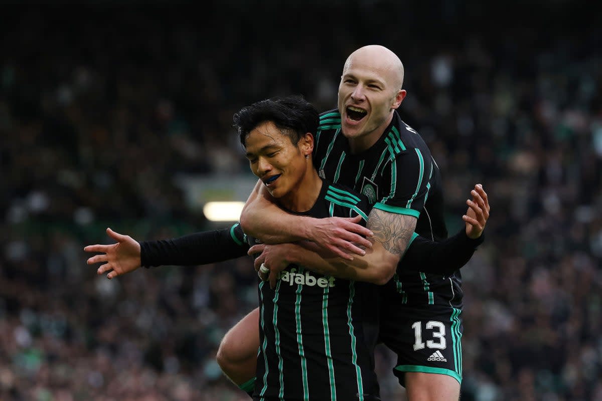 Reo Hatate celebrates the opening goal with Aaron Moy   (Getty Images)