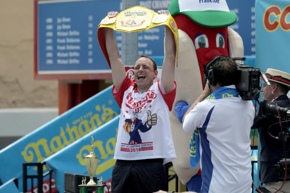 <p>Joey Chestnut wins the annual Nathan’s Hot Dog Eating Contest, setting a new world record by eating 74 hot dogs in Brooklyn, New York City, U.S., July 4, 2018. (Photo: Stephen Yang/Reuters) </p>