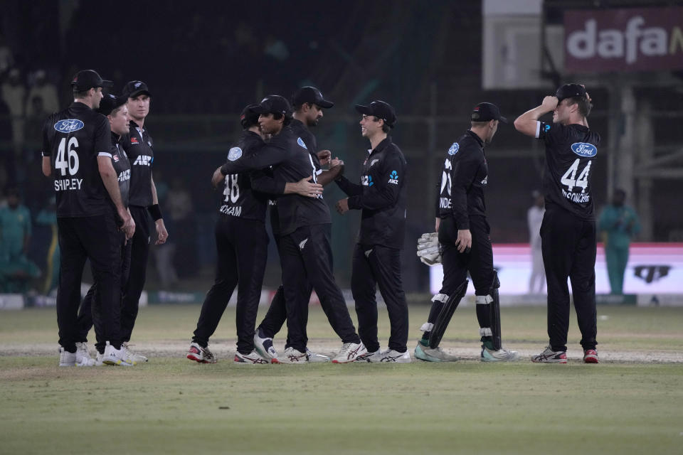 New Zealand players congratulate each others after winning the fifth one-day international cricket match against Pakistan, in Karachi, Pakistan, Sunday, May 7, 2023. (AP Photo/Fareed Khan)