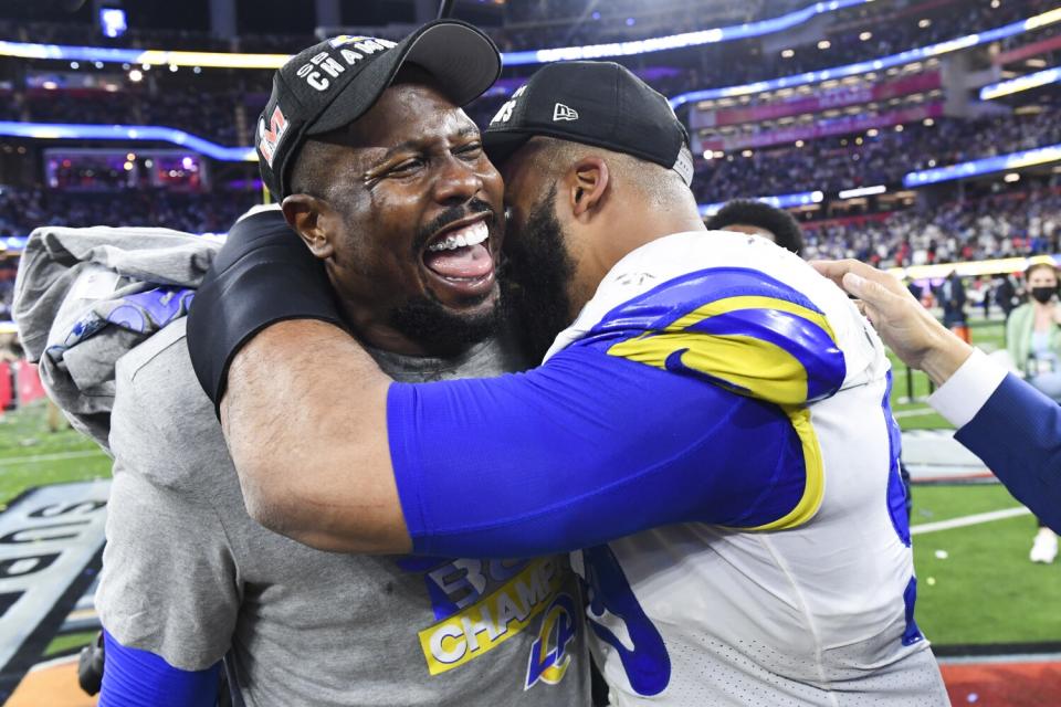 Rams linebacker Von Miller, left, celebrates with defensive lineman Aaron Donald after their Super Bowl LVI victory.