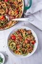 <p><a href="https://www.delish.com/cooking/recipe-ideas/a27470168/best-zucchini-noodles-recipe/" rel="nofollow noopener" target="_blank" data-ylk="slk:Zoodles;elm:context_link;itc:0;sec:content-canvas" class="link ">Zoodles</a> allow this dish to be extra delicious and satisfying while keeping it low carb and something you don't feel bad about. It's a win-win and we can't get enough.<br><br>Get the <strong><a href="https://www.delish.com/cooking/recipe-ideas/a23067486/burrito-zoodles-recipe/" rel="nofollow noopener" target="_blank" data-ylk="slk:Burrito Zoodles recipe;elm:context_link;itc:0;sec:content-canvas" class="link ">Burrito Zoodles recipe</a></strong>.</p>