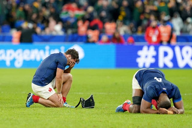 France players look dejected 