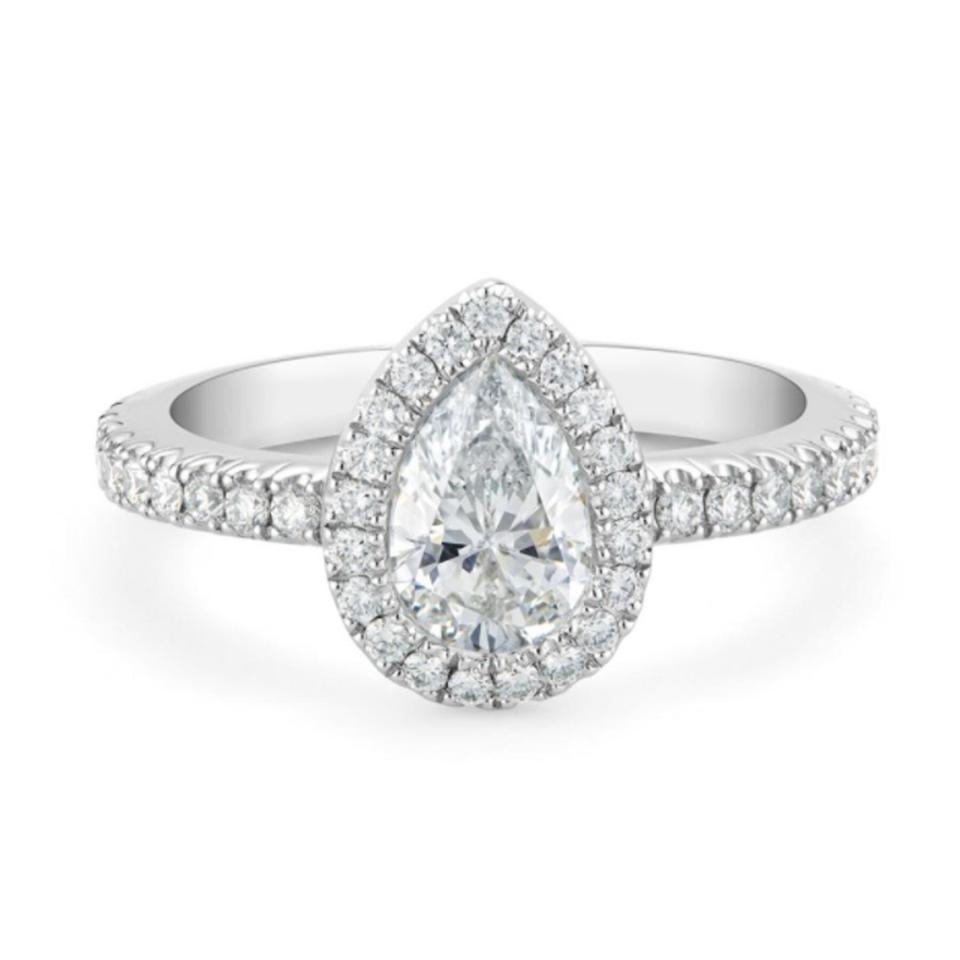 De Beers diamond pear engagement ring with halo