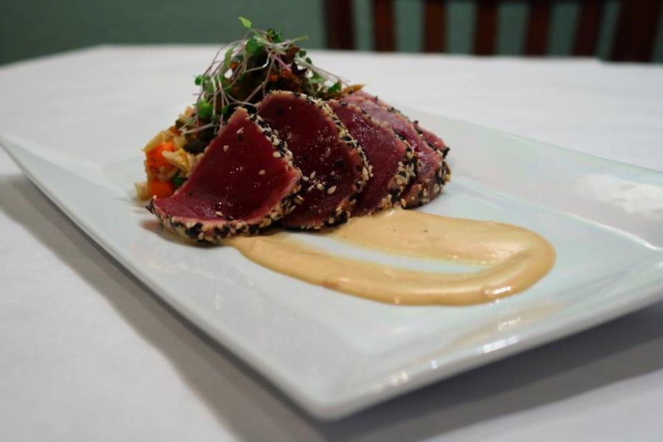 A photo of sesame crusted yellowfin tuna from Cypress restaurant that you'll love