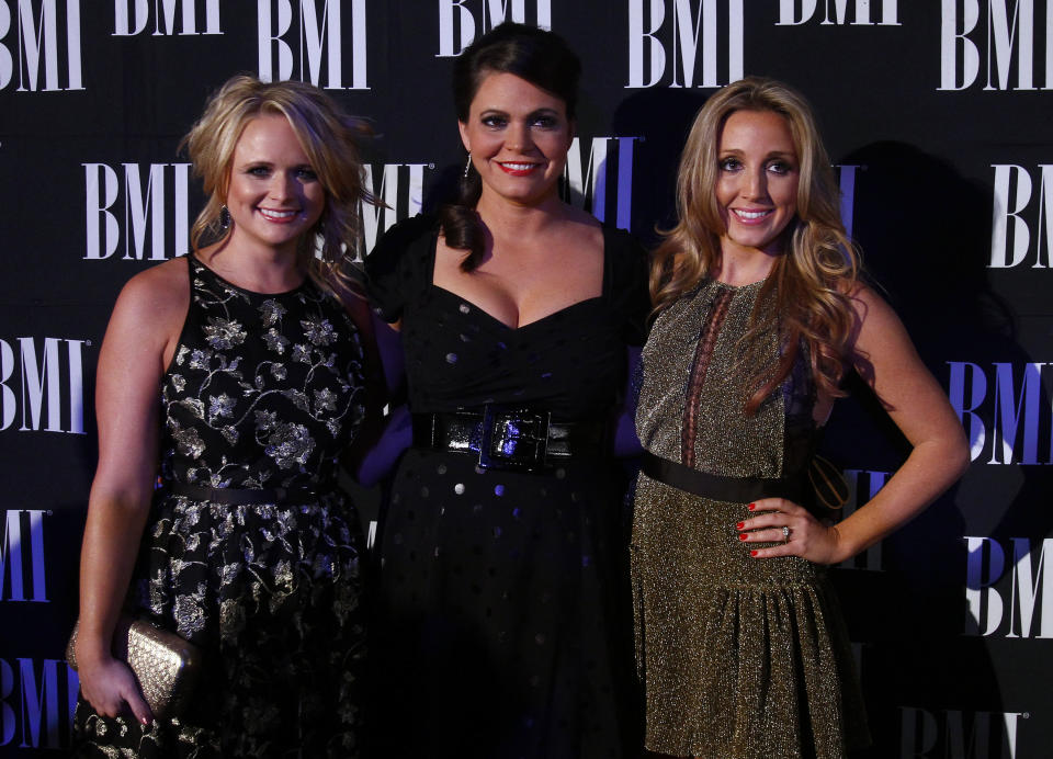 Miranda Lambert, left, Angaleena Presley, center, and Ashley Monroe of the Pistol Annies at the 60th Annual BMI Country Awards on Tuesday Oct. 30, 2012, in Nashville. (Photo by Wade Payne/Invision/AP)