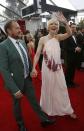 Actress Cate Blanchett, from the film "Blue Jasmine," arrives with playwright Andrew Upton at the 20th annual Screen Actors Guild Awards in Los Angeles, California January 18, 2014. REUTERS/Mario Anzuoni (UNITED STATES - Tags: ENTERTAINMENT) (SAGAWARDS-ARRIVALS)