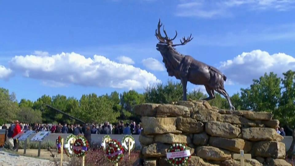 The last of six monuments, part of the Trail of the Caribou, was dedicated in a ceremony on Friday.