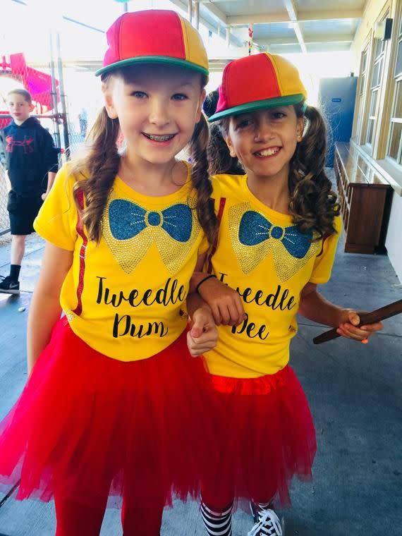 <p><strong>JeweliasCloset</strong></p><p>etsy.com</p><p><strong>$29.95</strong></p><p>It's almost impossible losing your other half with this incredibly bright and fun <em>Alice in Wonderland</em> duo costume. Rhinestones and glitter add a sparkly touch to the shirts, and you have the option to keep or remove the words on the front.<br></p>