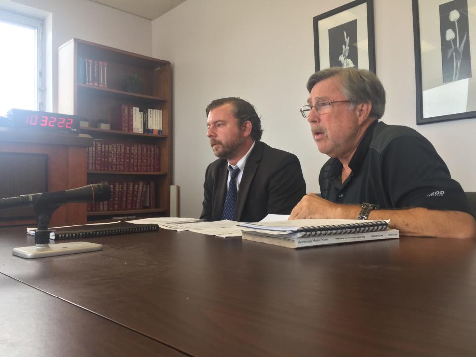 Represented by attorney Tyler J. Whitney of Burton & Merlitti, left, landlord Gary L. Thomas delivers a legal argument in a Sept. 1, 2017, eviction hearing against one of his tenants.