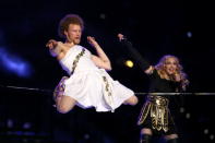 <div class="caption-credit"> Photo by: Getty Images/Al Bello</div>Madonna was practically upstaged in 2012 by this guy: Andy Lewis, aka Slacker Andy, the professional slackliner whose little white Grecian number had folks buzzing about the "Richard Simmons lookalike."