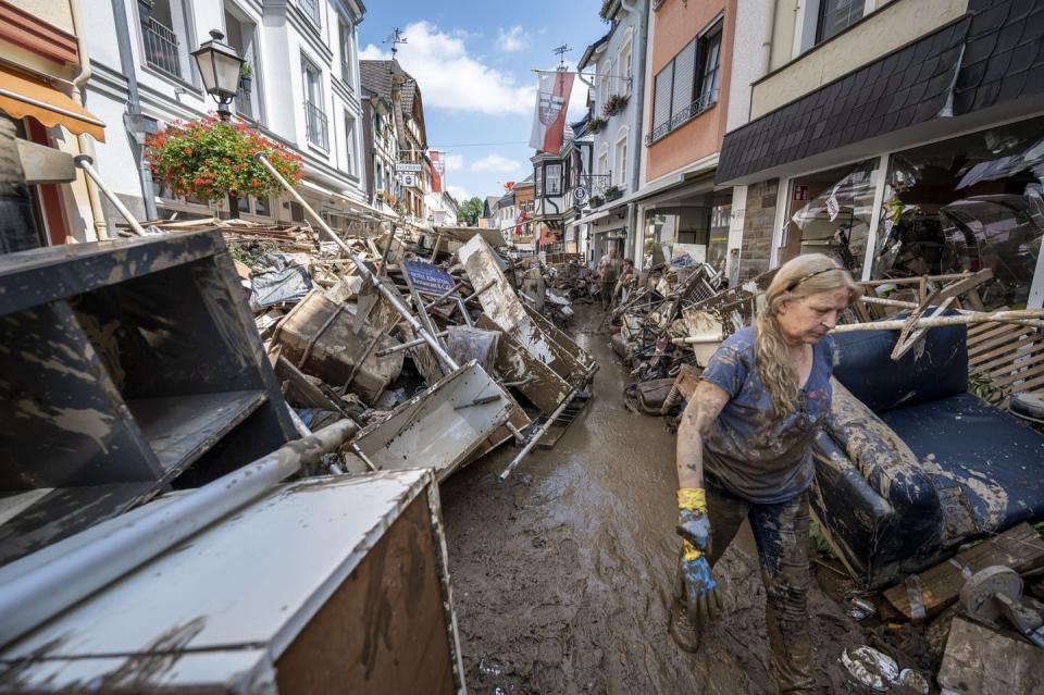 Extreme rain storms triggered flooding and mudslides in Western Europe in July 2021, killing more than 200 people. <a href="https://www.gettyimages.com/detail/news-photo/volunteers-and-residents-start-the-clean-up-process-at-news-photo/1329350141?adppopup=true" rel="nofollow noopener" target="_blank" data-ylk="slk:Thomas Lohnes/Getty Images;elm:context_link;itc:0;sec:content-canvas" class="link ">Thomas Lohnes/Getty Images</a>