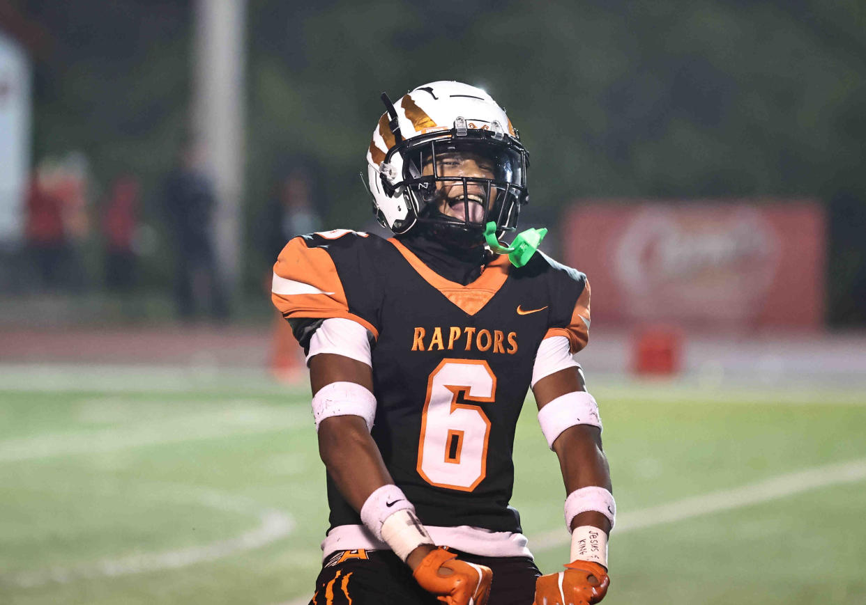 Anderson Raptors defensive back Ace Alston (6) celebrates during their regional championship win over Withrow 49-28 Friday, Nov. 17, 2023.