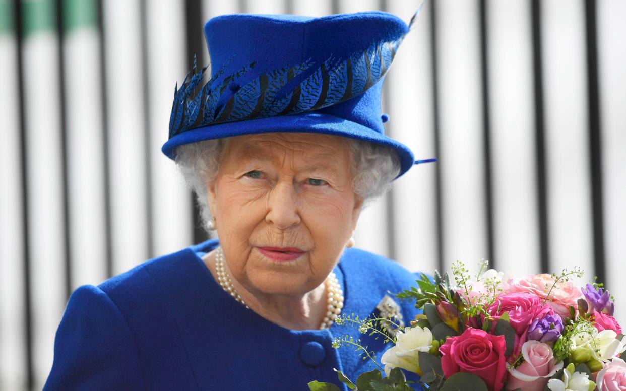 Britain's Queen Elizabeth attends the unveiling on the new memorial to members of the armed services who served and died in the wars in Iraq and Afghanistan, in London, Britain, March 9, 2017