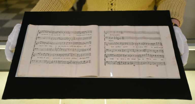 A photo taken on February 16, 2016 at the Czech Music Museum in Prague shows the recently discovered sheets of music notes composed by Austrian composer Wolfgang Amadeus Mozart together with Italian composer Antonio Salieri